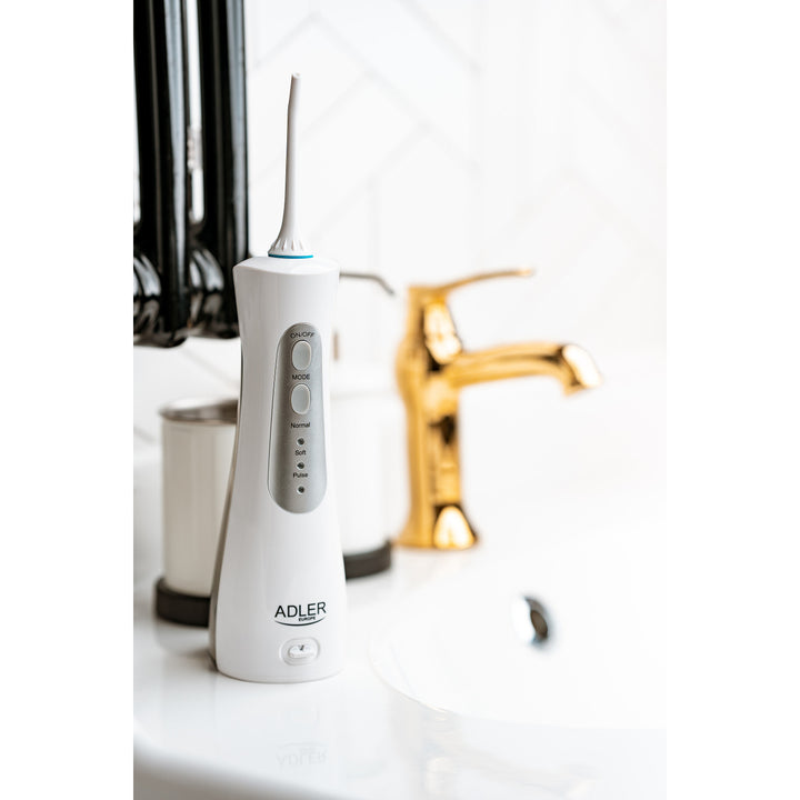 Irrigateur de voyage Adler AD 2176 et 2 têtes rotatives interchangeables