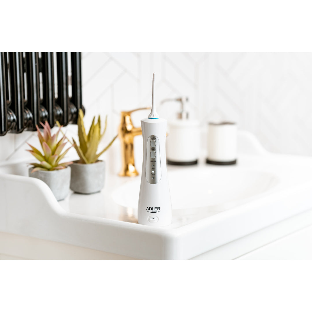 Irrigateur de voyage Adler AD 2176 et 2 têtes rotatives interchangeables