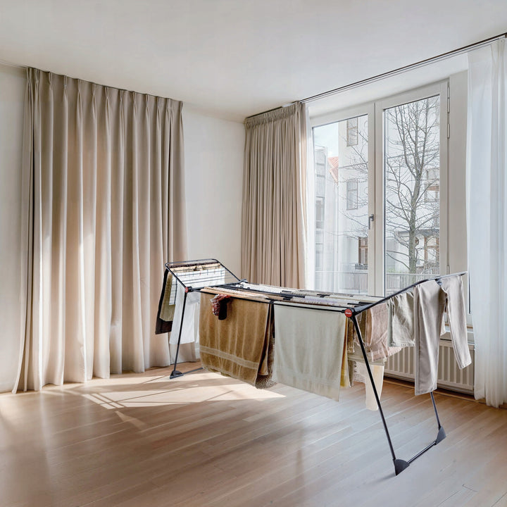 Séchoir à linge Vileda Infinity Flex Ultimate, couleur noire, jusqu'à 30 m² de surface de séchage, extensible, structure surélevée, crochets à linge, roulettes intégrées, 179620